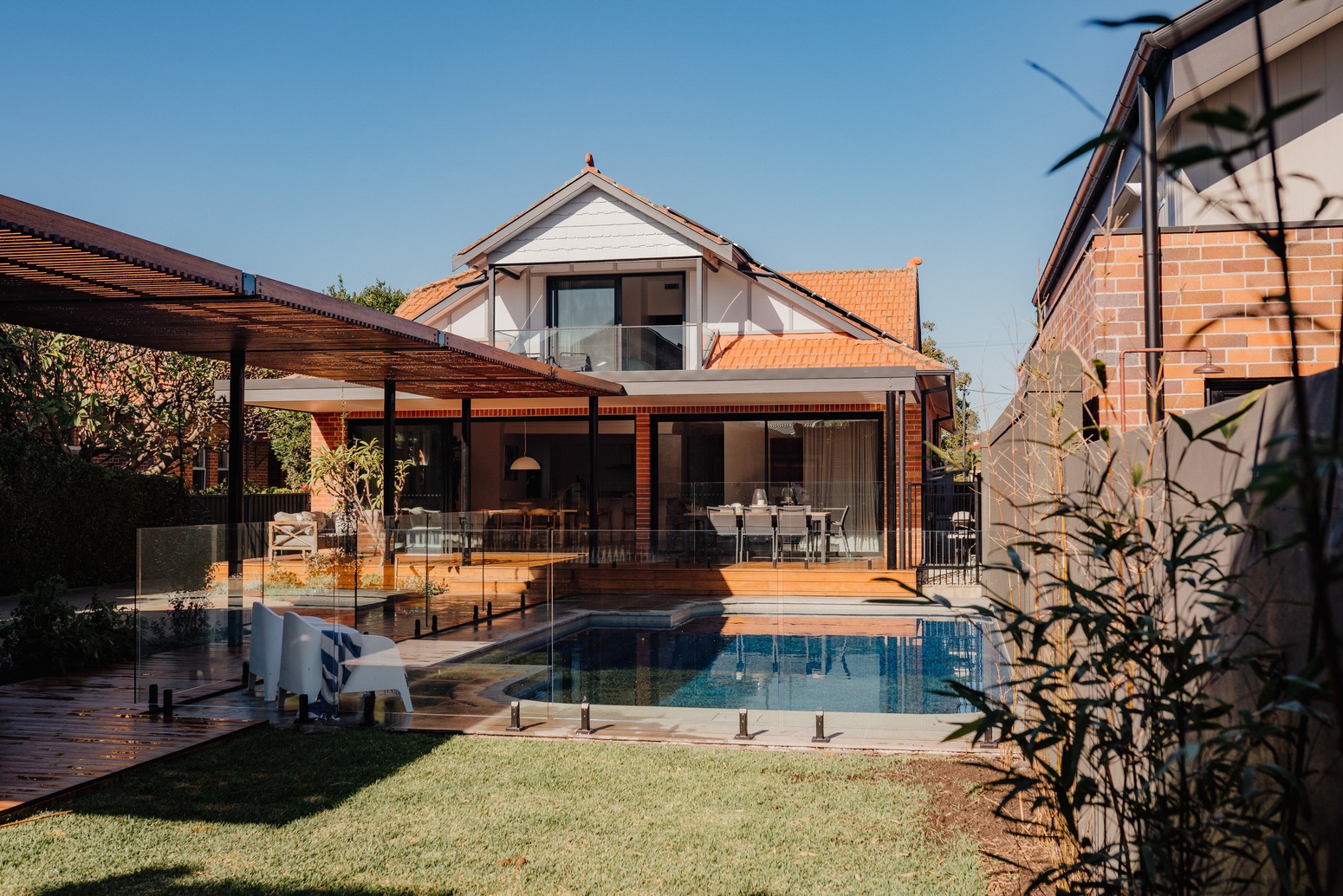 View of the front of the house with the pool Hamilton Jenkins Residential